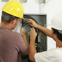 Electricians Install Panel